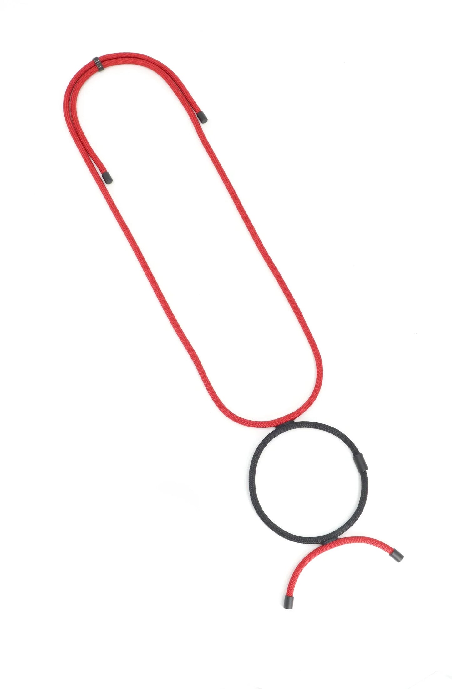 Linea collection bold necklace with red cord and black circle pendant, modern wearable art jewelry