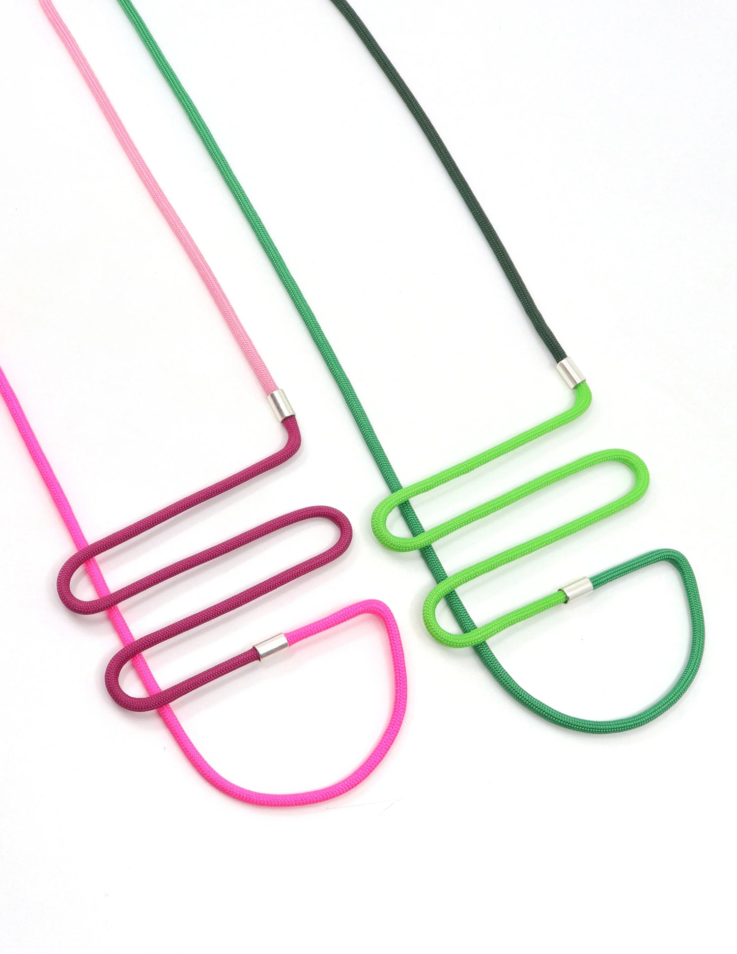 FuturisNow Linea collection colorful modular necklaces with pink, green, and purple loops on white background